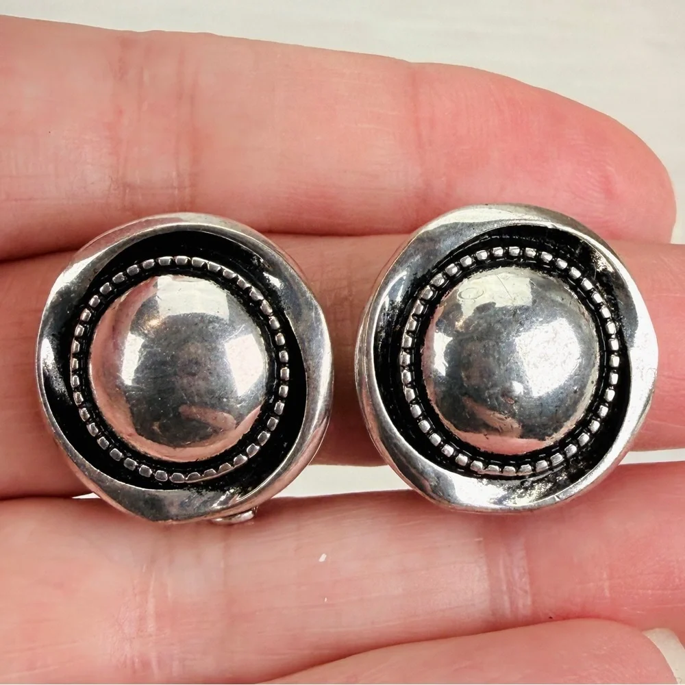 Vintage Silvertone round weighted clip on earrings